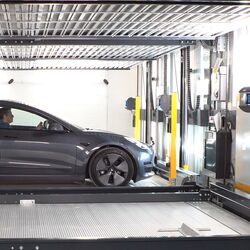 The car is parked on a parking platform