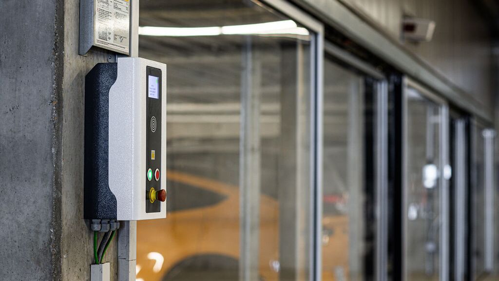 The image shows a control panel of a parking system.