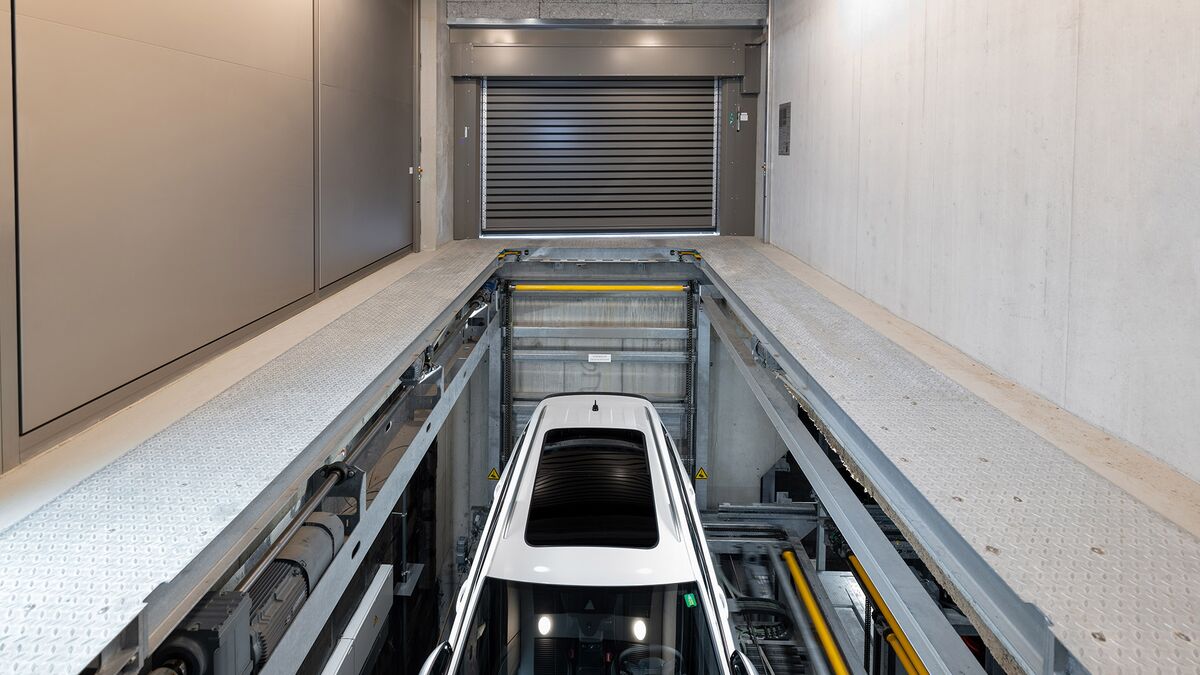 The car descends into the underground car park