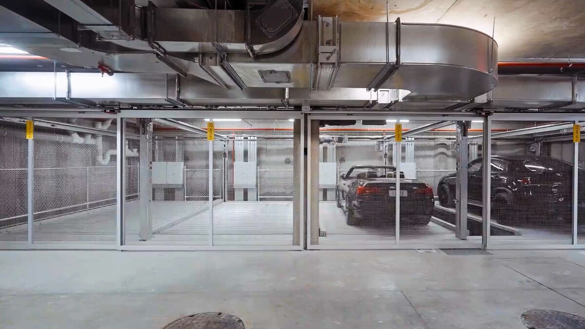 A car drives into a car parking system