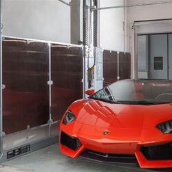 1452677348-72_1-1-car-lift-with-driver-on-board.jpg