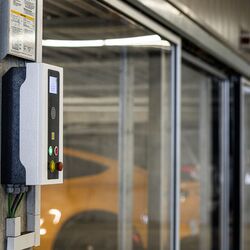 The image shows a control panel of a parking system.