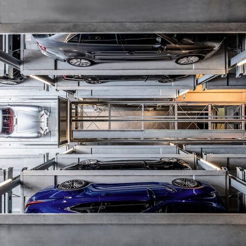 Interior view of the parking system with a sports car parked inside