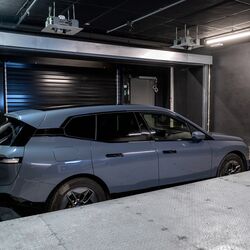The car is positioned in the handover bay, ready for the parking process