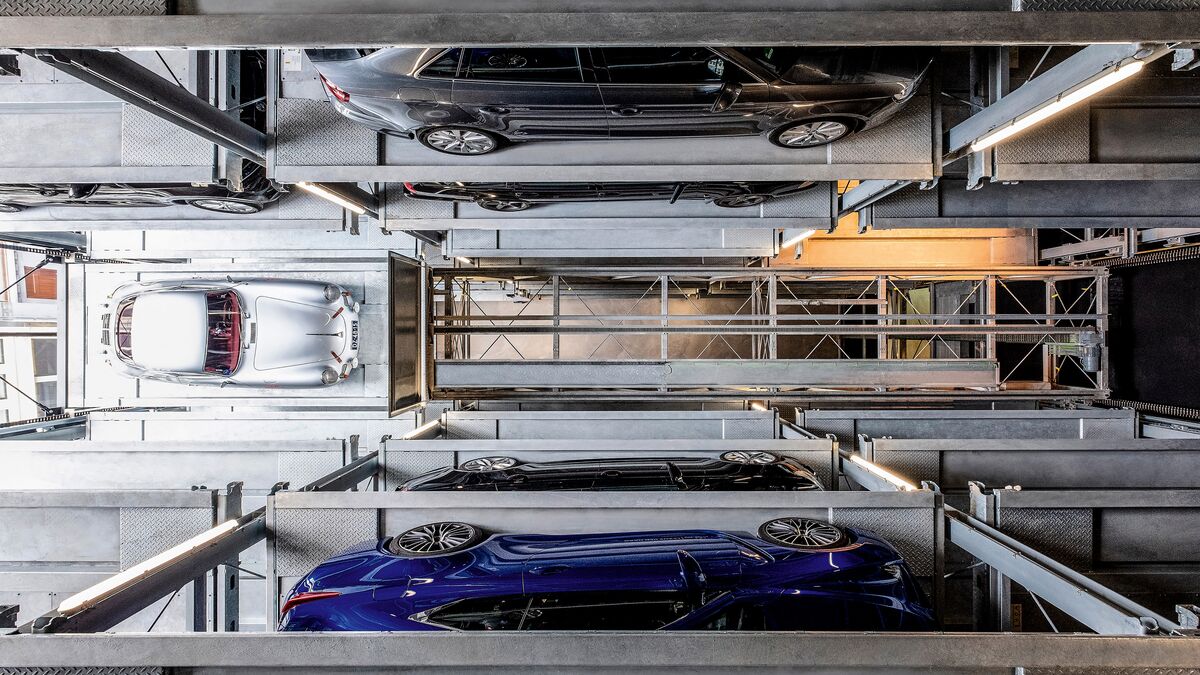 Interior view of the parking system with a sports car parked inside