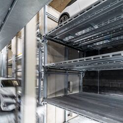 The car is parked in a car parking system