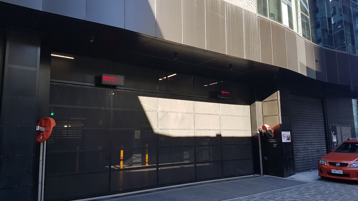 The entrance to the parking system is secured with a gate.