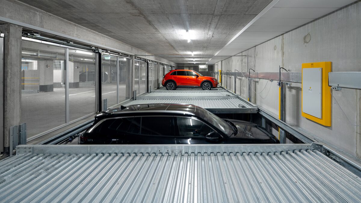 The car moves down one level in the parking system