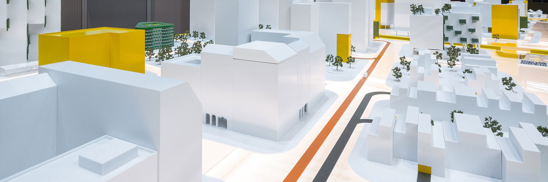 A section of a city model featuring buildings and colourful paths