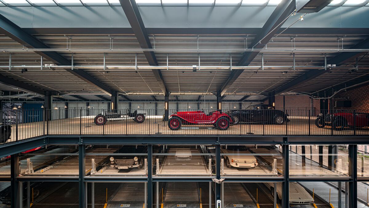 A museum with a parking system for cars and classic cars