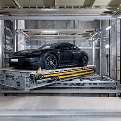 The car is parked on the platform within the parking system