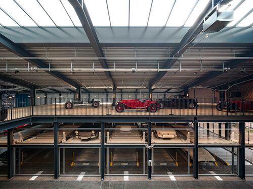 A museum with a parking system for cars and classic cars