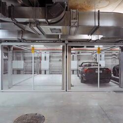 A car drives into a car parking system